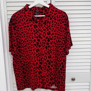 Red , animal print men’s shirt.